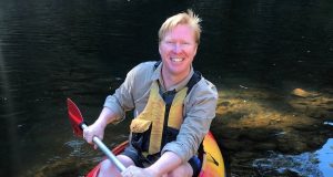 Darren Cogan kayaking in the Kangaroo Valley.